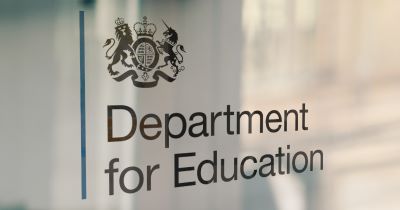 Department for Education sign representing school performance tables and academic results.